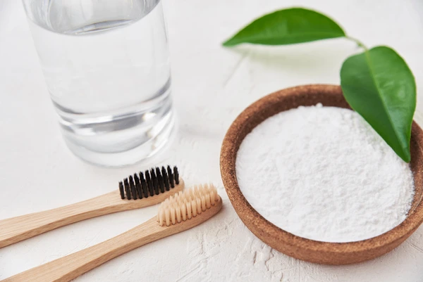 Natural-ingredients-for-teeth-whitening-including-coconut-oil-and-baking-soda